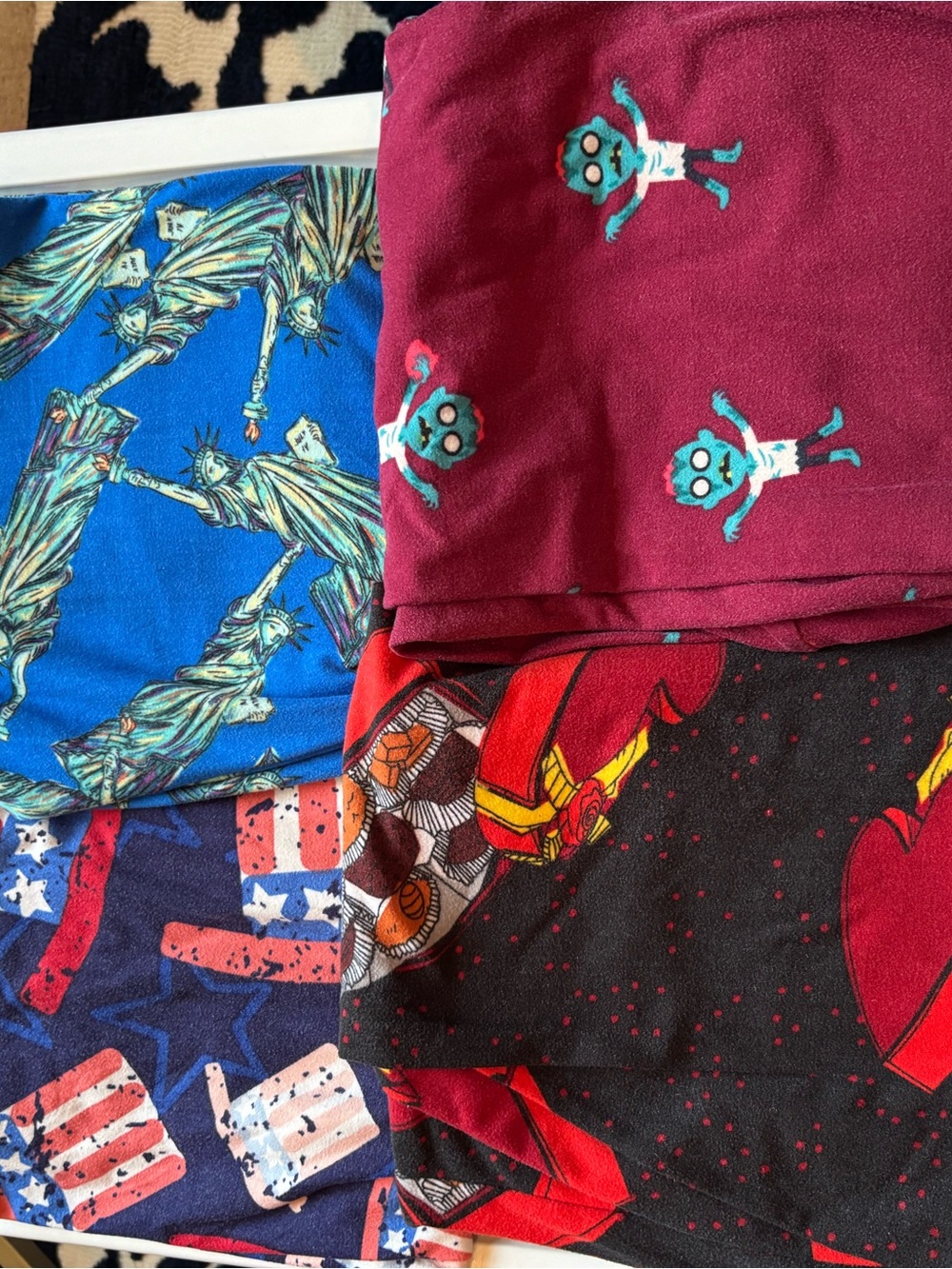 Four pairs of holiday LuLaRoe Leggings